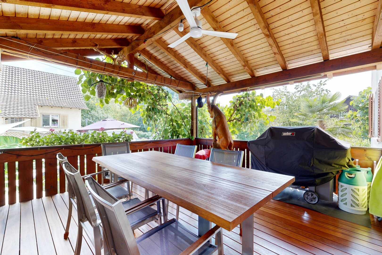 terrasse mit deck, grill, essbereich im freien, deckenventilator, und from property