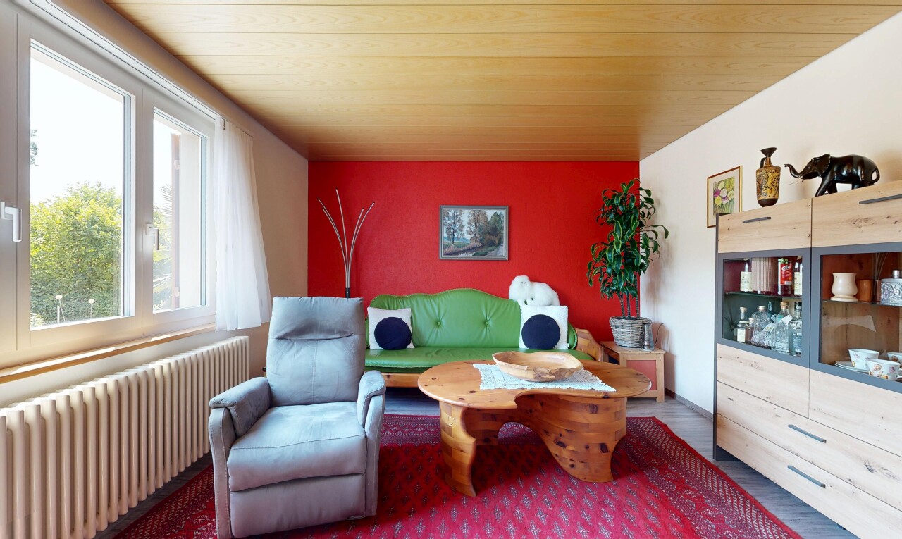 wohnzimmer mit kühler, gipskartonwand, drywall, inside property, und holzfußboden
