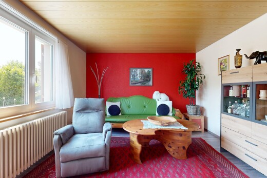 wohnzimmer mit kühler, gipskartonwand, drywall, inside property, und holzfußboden