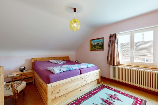 zimmer / schlafzimmer mit kühler, vaulted ceiling, dachschräge, pendelleuchte, und zusätzliches zimmer
