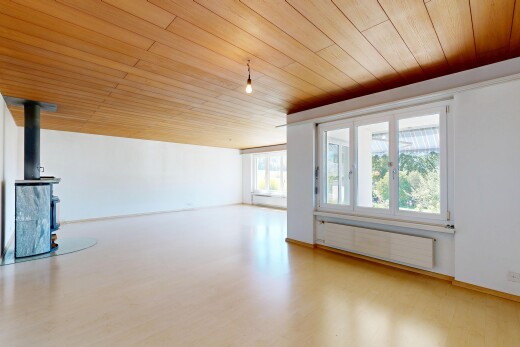 unfurnished room featuring wooden ceiling, radiator heating unit, and light wood-style flooring