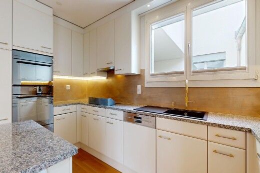 küche mit natürliches licht, natural light, waschbecken, holzfußboden, und wood finish floor