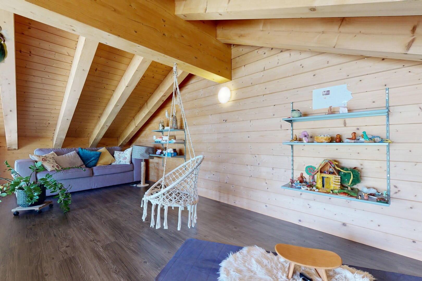 living area featuring lofted ceiling with beams, wood walls, dark wood-style floors, and wooden ceiling