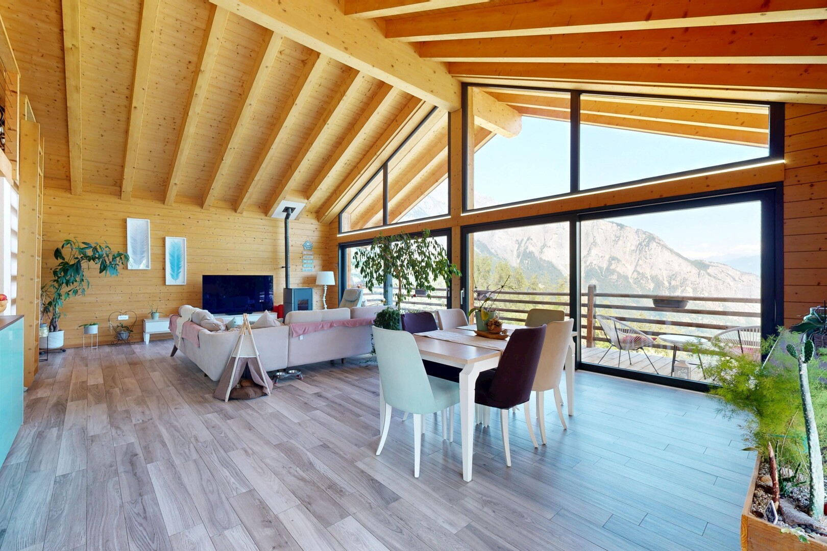 living area with wooden walls and light wood-type flooring