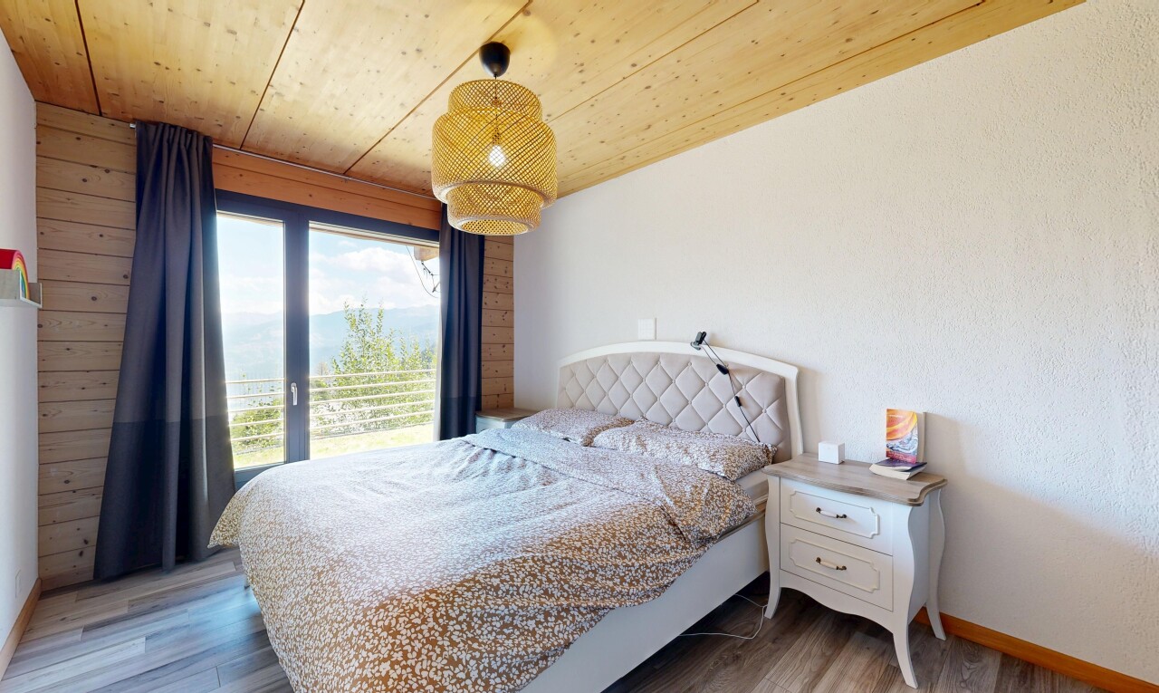 room / bedroom with wood ceiling, pendant lighting, and wood finished floors