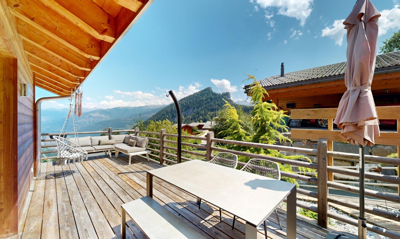 balcony with a deck with mountain view and outdoor lounge area
