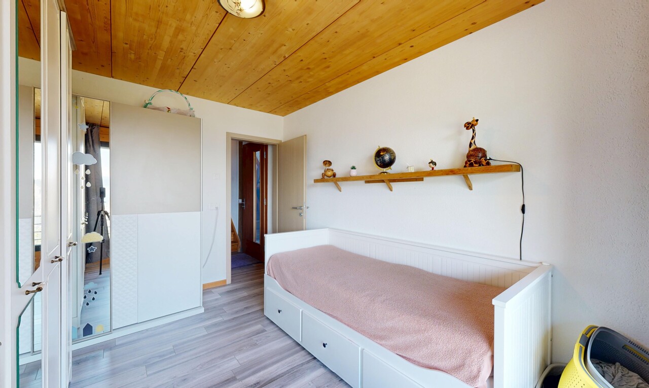 room with wood ceiling and light wood-style floors