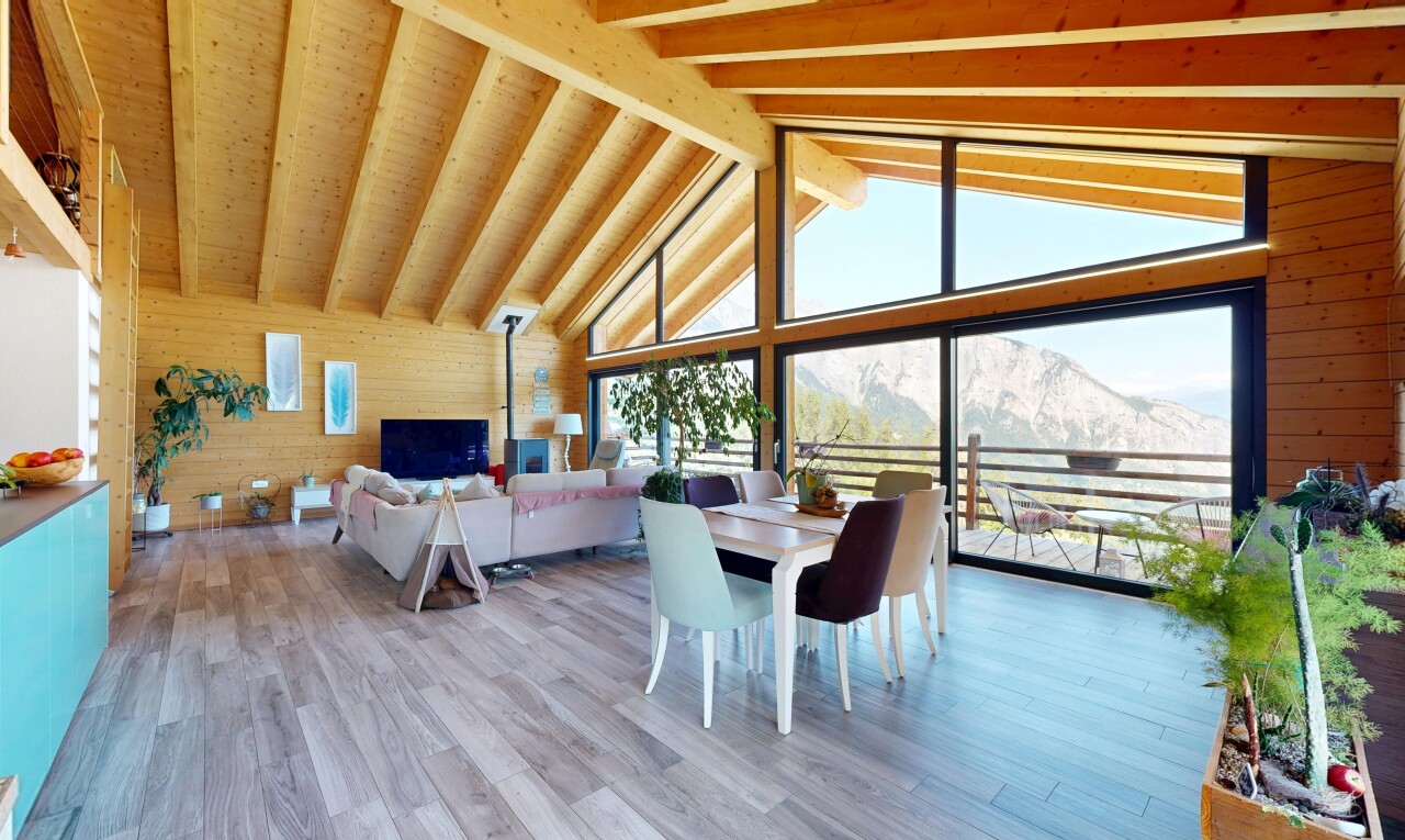 living area with wooden walls and light wood-type flooring