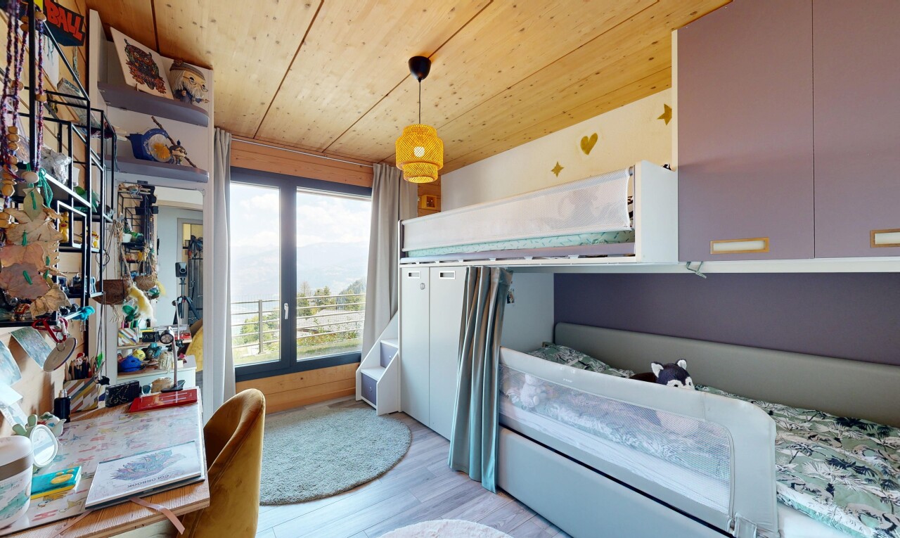 room with wood ceiling, hanging light fixtures, and light wood-type flooring