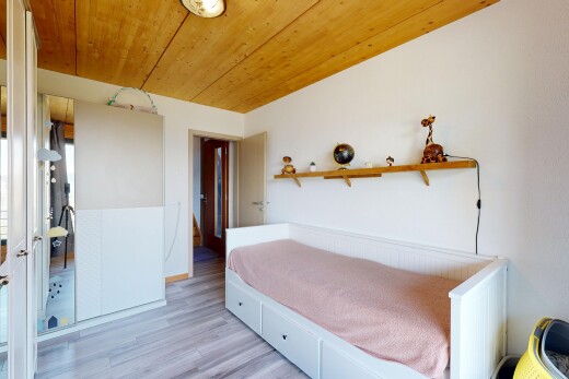 room with wood ceiling and light wood-style floors