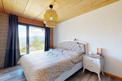 room / bedroom with wood ceiling, pendant lighting, and wood finished floors