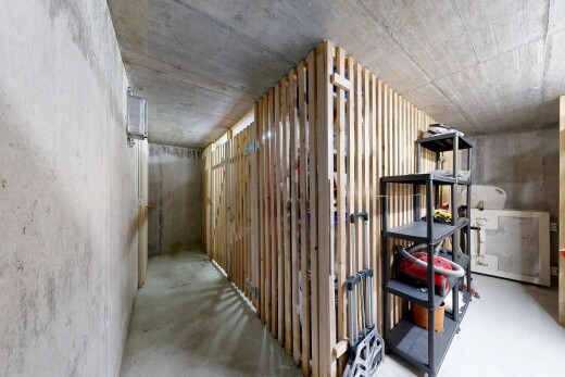 corridor with concrete flooring