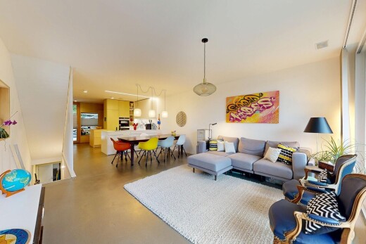 wohn- / esszimmer mit inside property, finished concrete floor, concrete floor, betonboden, und drywall