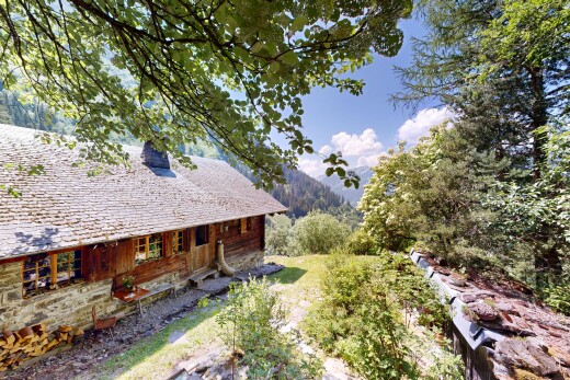 außenansicht mit day time, holzverkleidung, und property visible