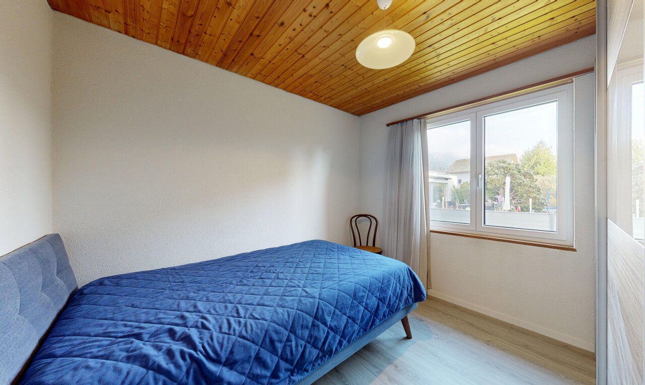 room / bedroom featuring wood finished floors and wooden ceiling