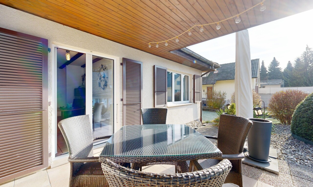 terrace with outdoor dining area and a patio