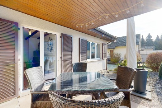 terrasse avec coin repas extérieur, terrasse, et from property