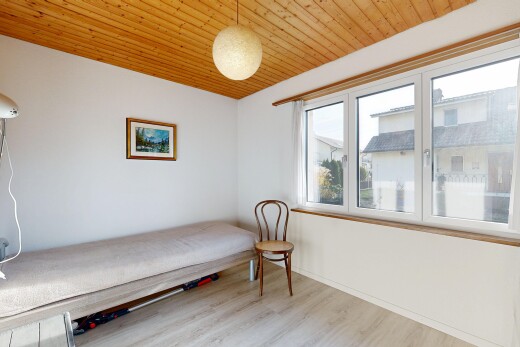room with wooden ceiling and light wood-style floors