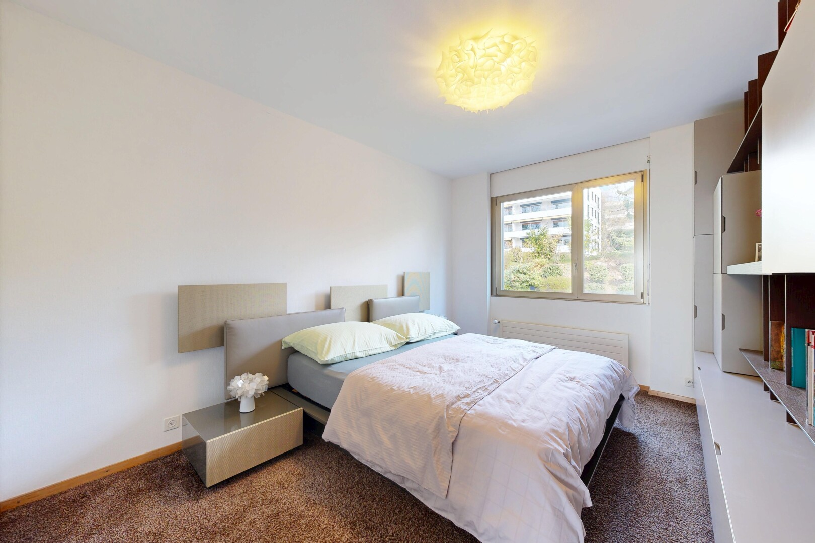 room with dark carpet and baseboards