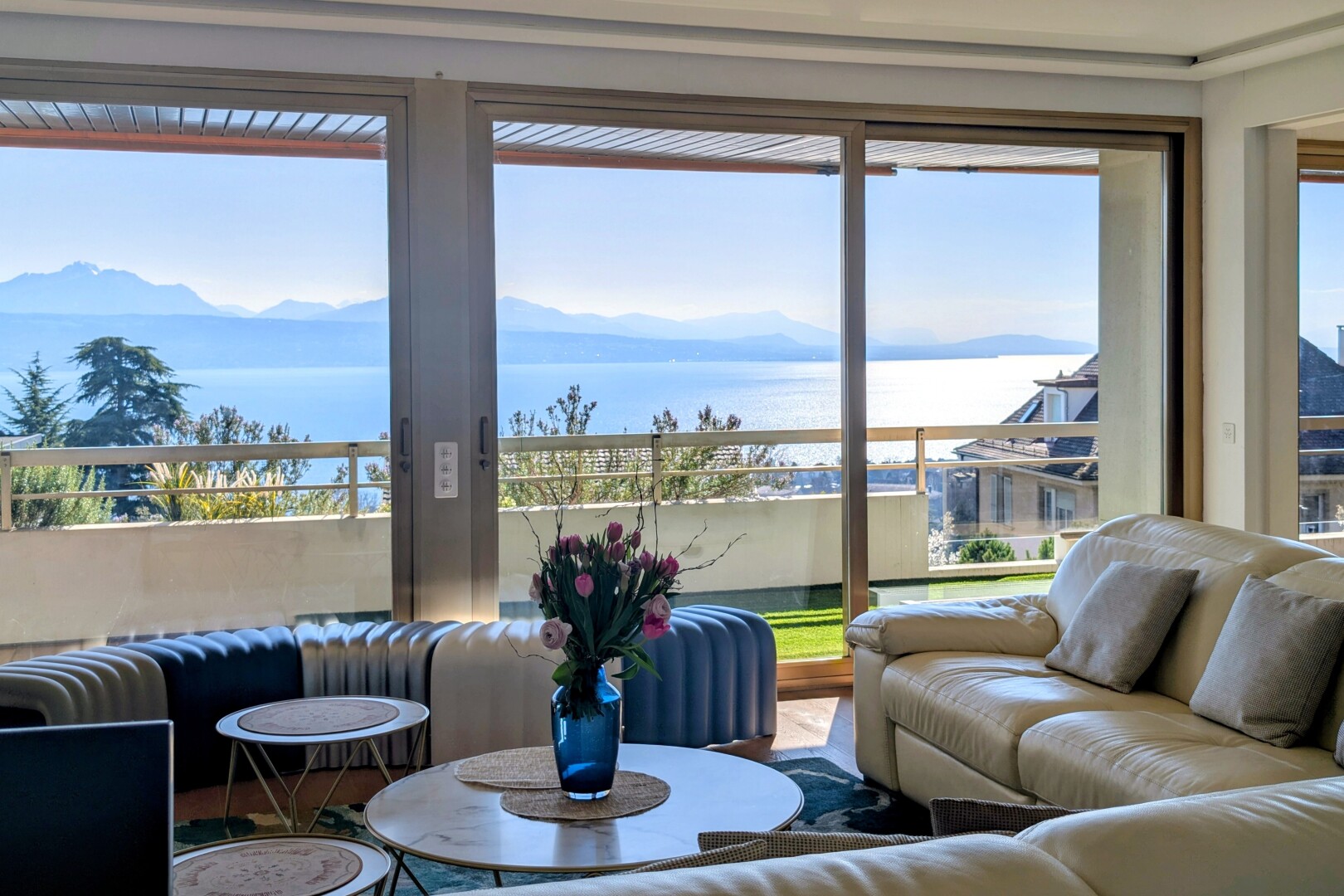 living room with a water and mountain view