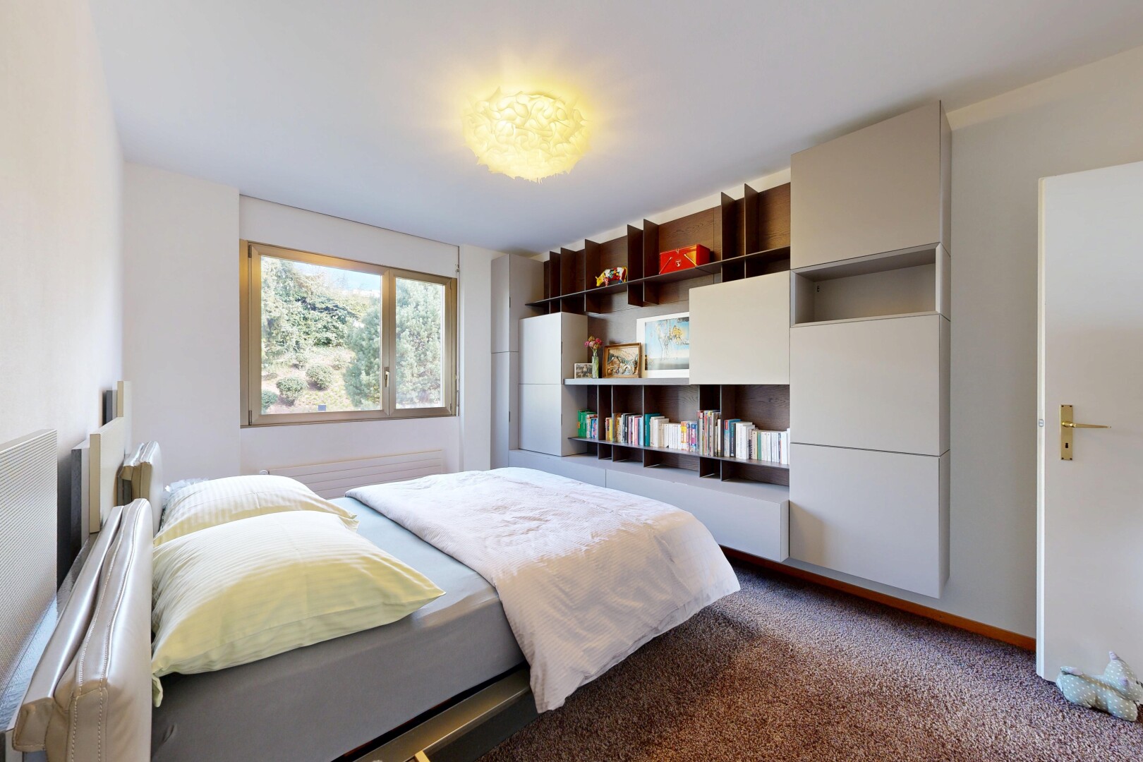 room with dark colored carpet