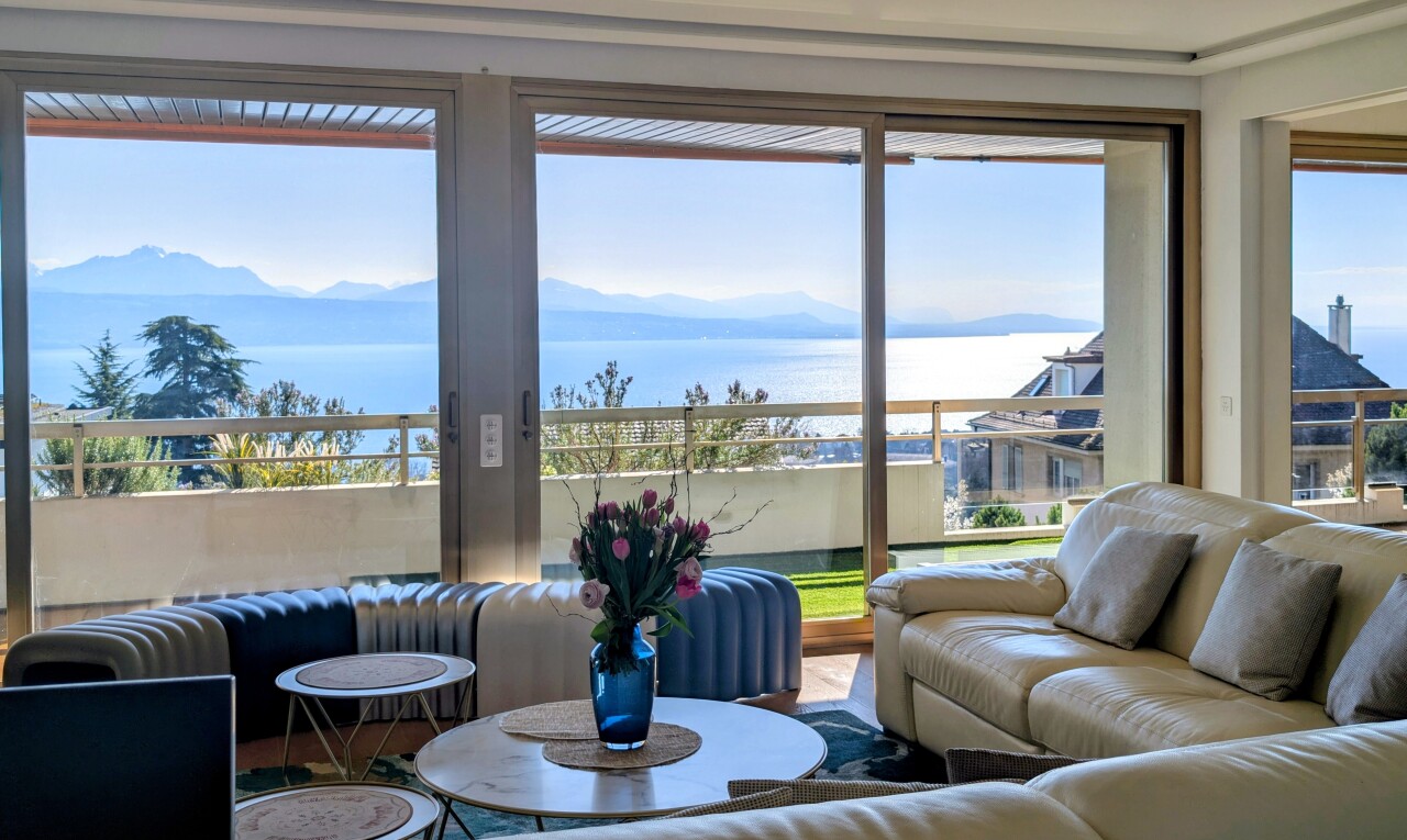 living room with a water and mountain view