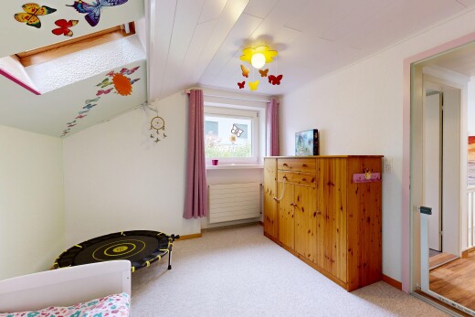 room / bedroom with light carpet and lofted ceiling