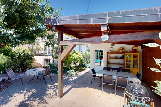 terrace with outdoor dining area, a patio area, and stairs