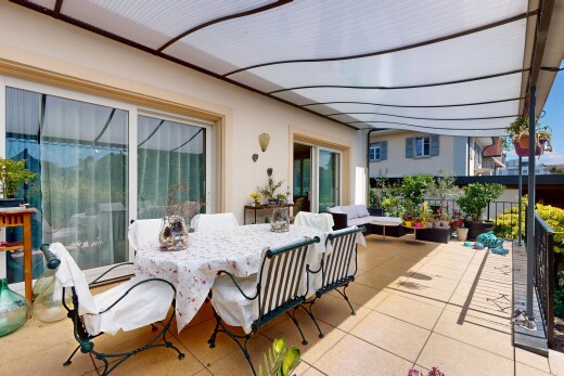 terrace with an outdoor hangout area