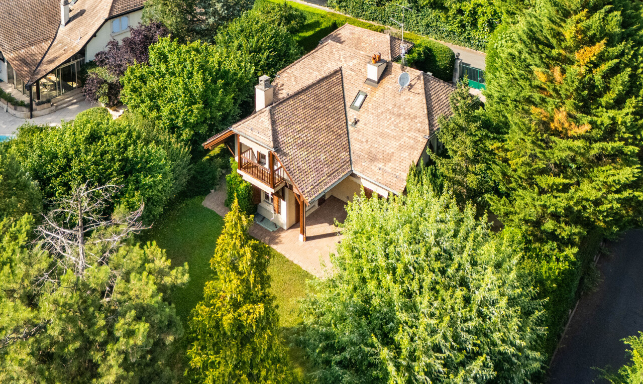 view of property featuring a chimney