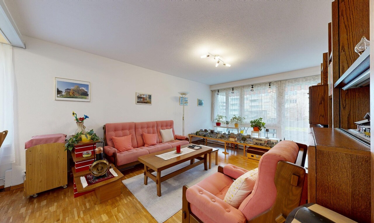 wohnzimmer mit holzfußboden, wood finish floor, gipskartonwand, drywall, und inside property