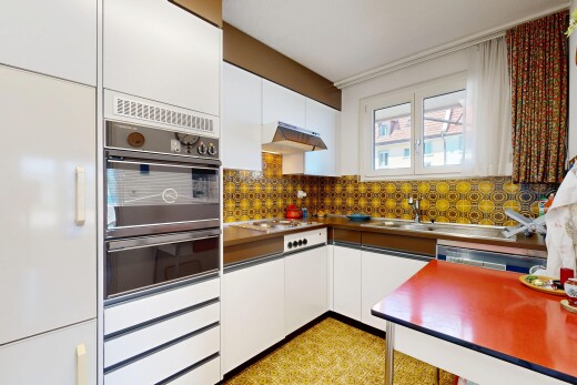 kitchen featuring white cabinetry, oven, built in fridge, a warming drawer, and dark countertops