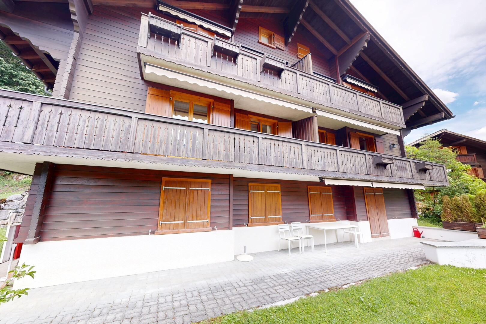 view of apartment building / complex with an attached garage