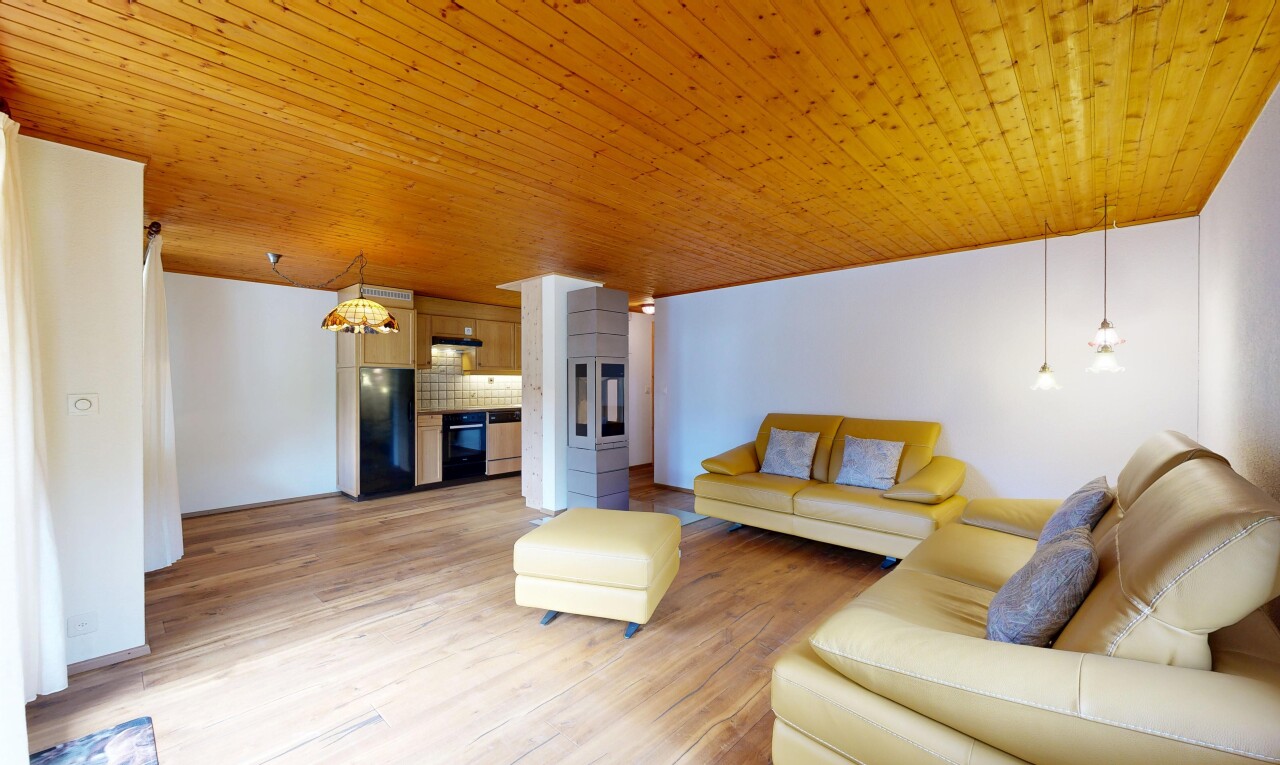 living room with wood ceiling and light wood-style flooring