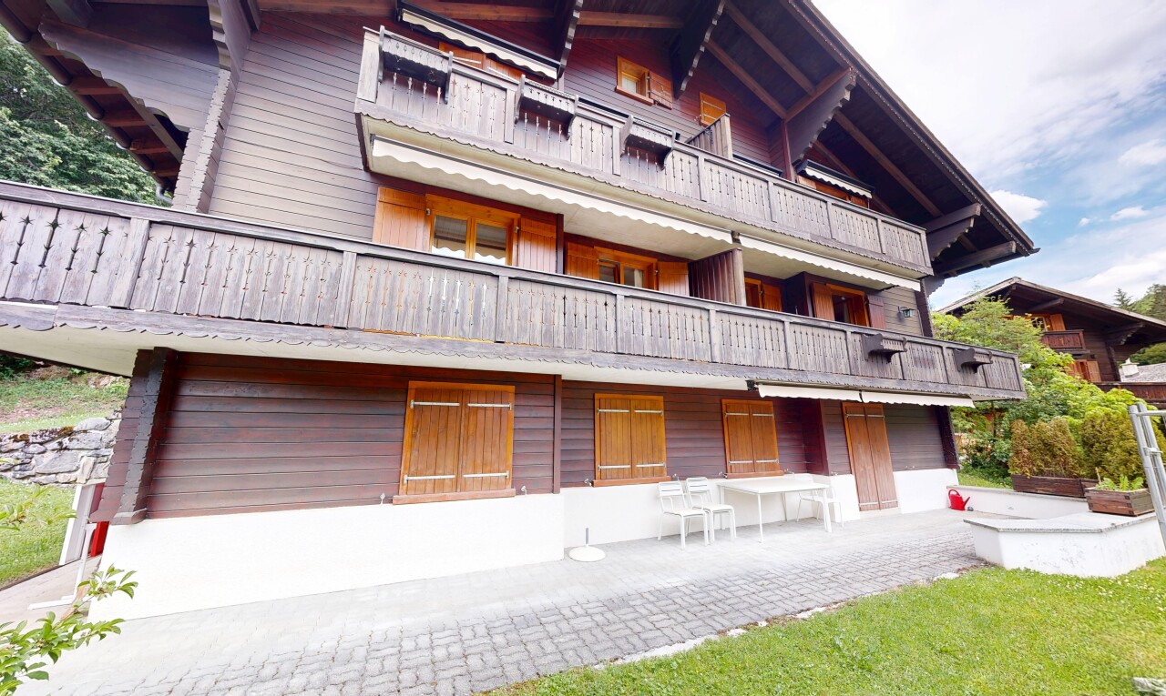 view of apartment building / complex with an attached garage