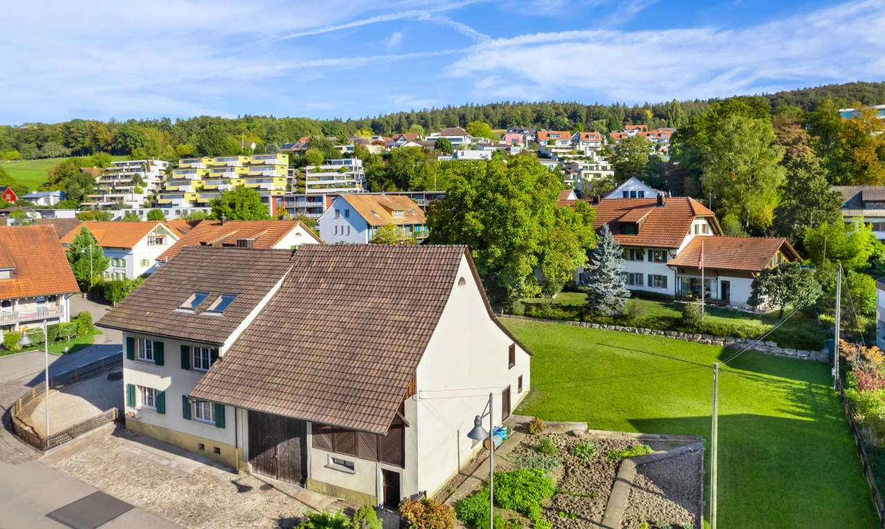 view of home featuring a lawn