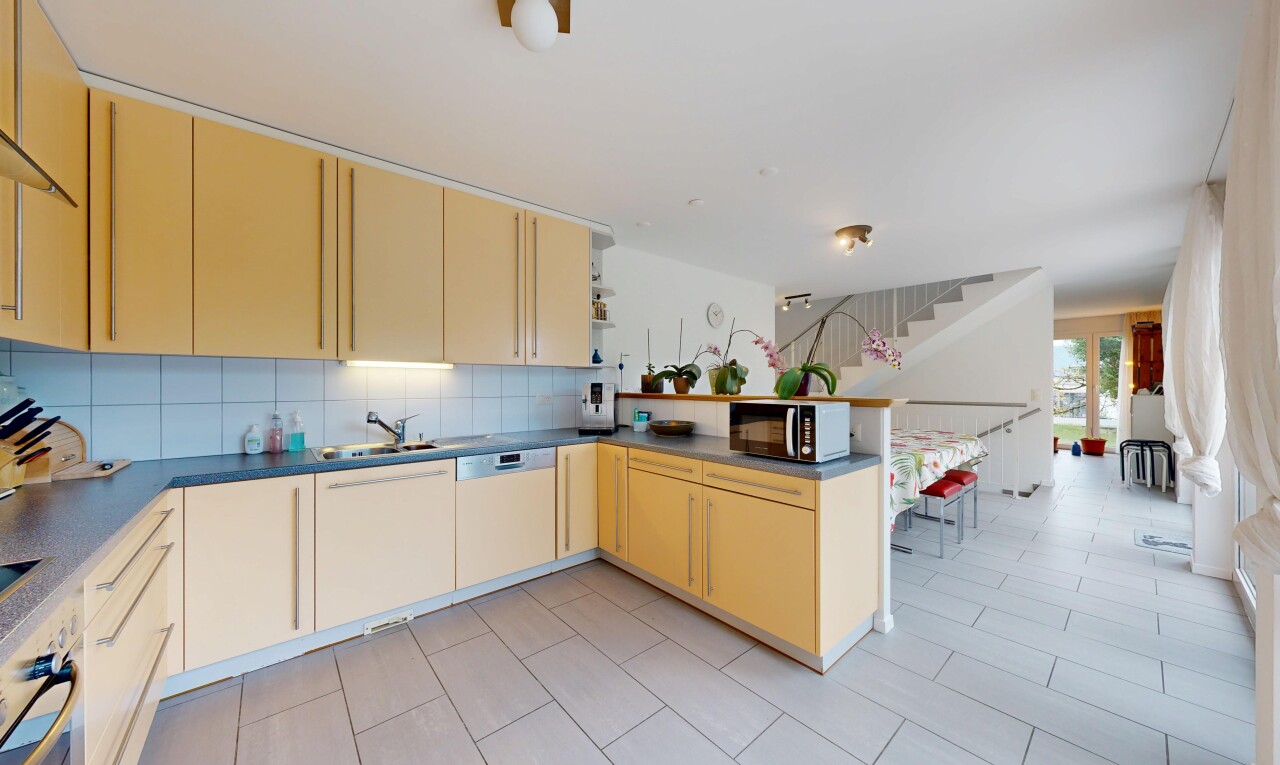 küche mit küchentheke, kitchen peninsula, light floor, arbeitsplatten, und dark countertops