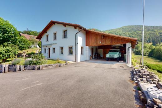 außenansicht mit blick auf die berge und carport angeschlossen