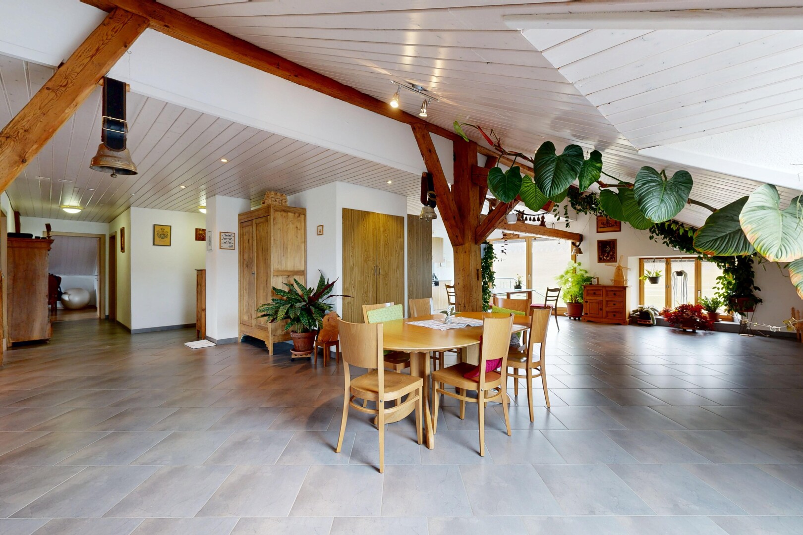 dining area featuring vaulted ceiling with beams, wood ceiling, and rail lighting