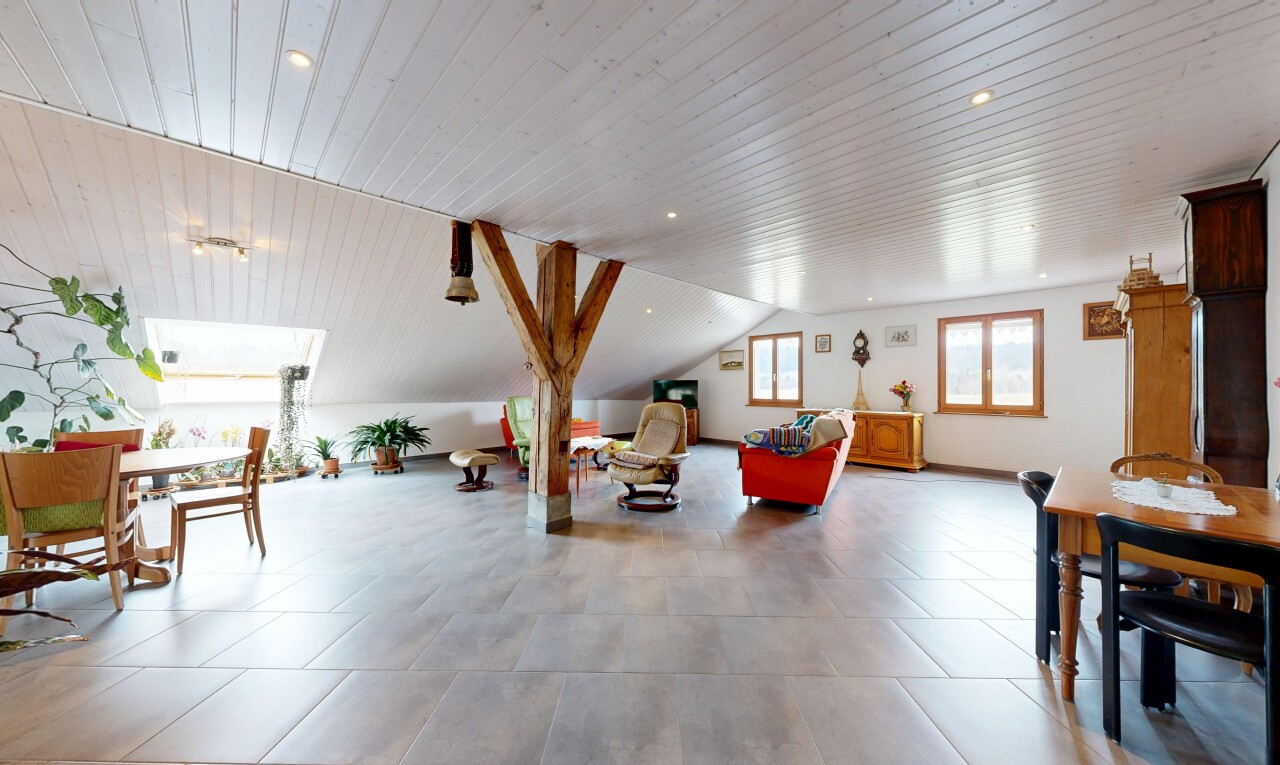 living area featuring a vaulted wooden ceiling and recessed lighting