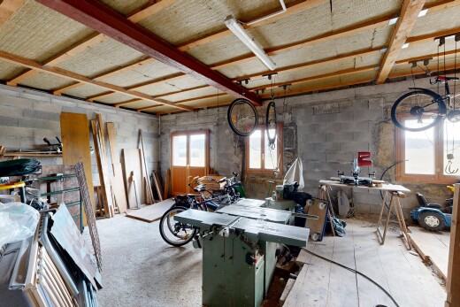 dining area with concrete block wall