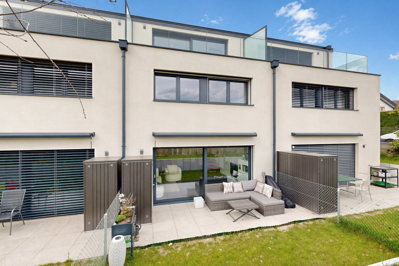 view of property featuring stucco siding, a patio, and an outdoor living space