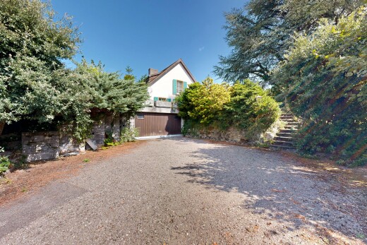 view of property with stairway