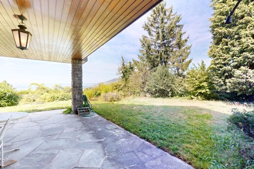 garden featuring a yard and a patio area