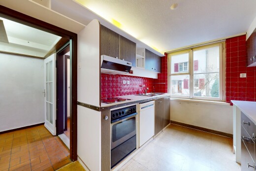 kitchen featuring stainless steel oven, ventilation hood, white dishwasher, open shelves, and decorative backsplash