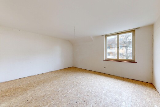 unfurnished room with light carpet