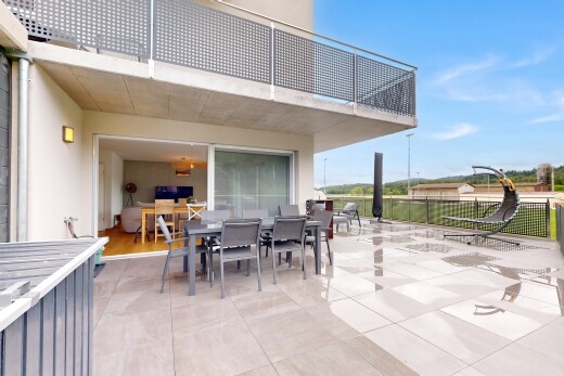 terrace with outdoor dining space, a patio area, and a balcony