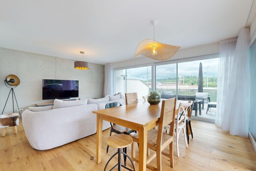 living / dining area featuring light wood-style flooring