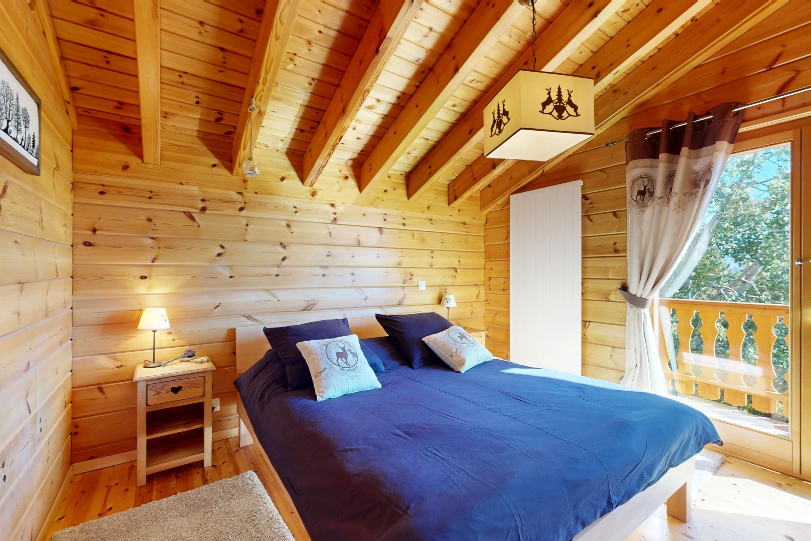 room / bedroom featuring wood ceiling, wood walls, light wood-type flooring, and vaulted ceiling with beams
