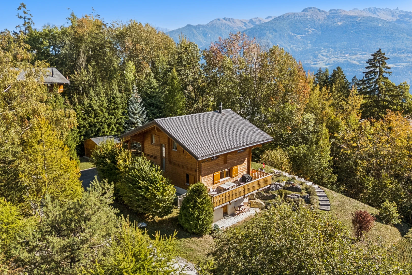 outdoor house featuring a mountain view and a forest view